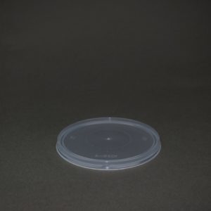 A plastic container sitting on top of a table.