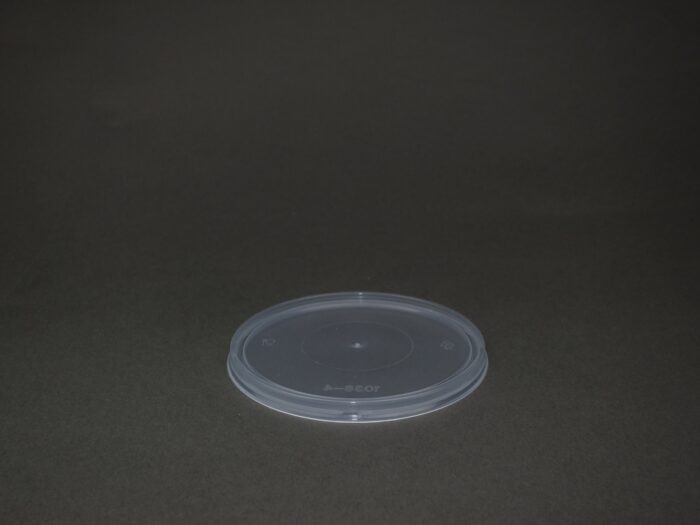 A plastic container sitting on top of a table.