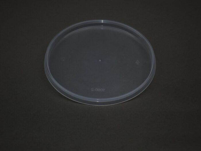 A plastic container sitting on top of a table.