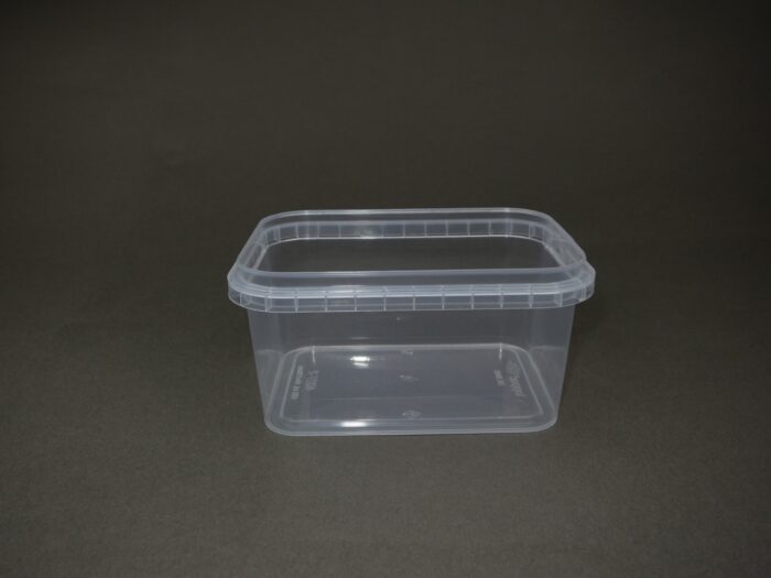 A plastic container sitting on top of a table.