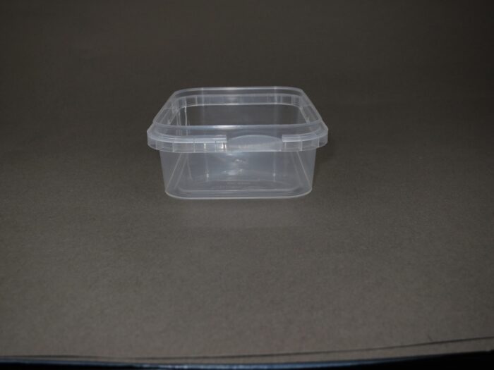 A plastic container sitting on top of a table.