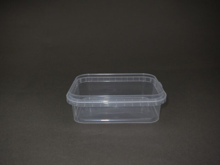 A plastic container sitting on top of a table.