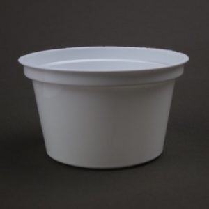 A white plastic container sitting on top of a table.