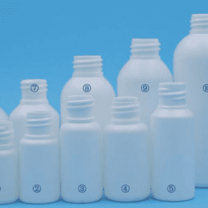 A group of white bottles on top of a blue background.