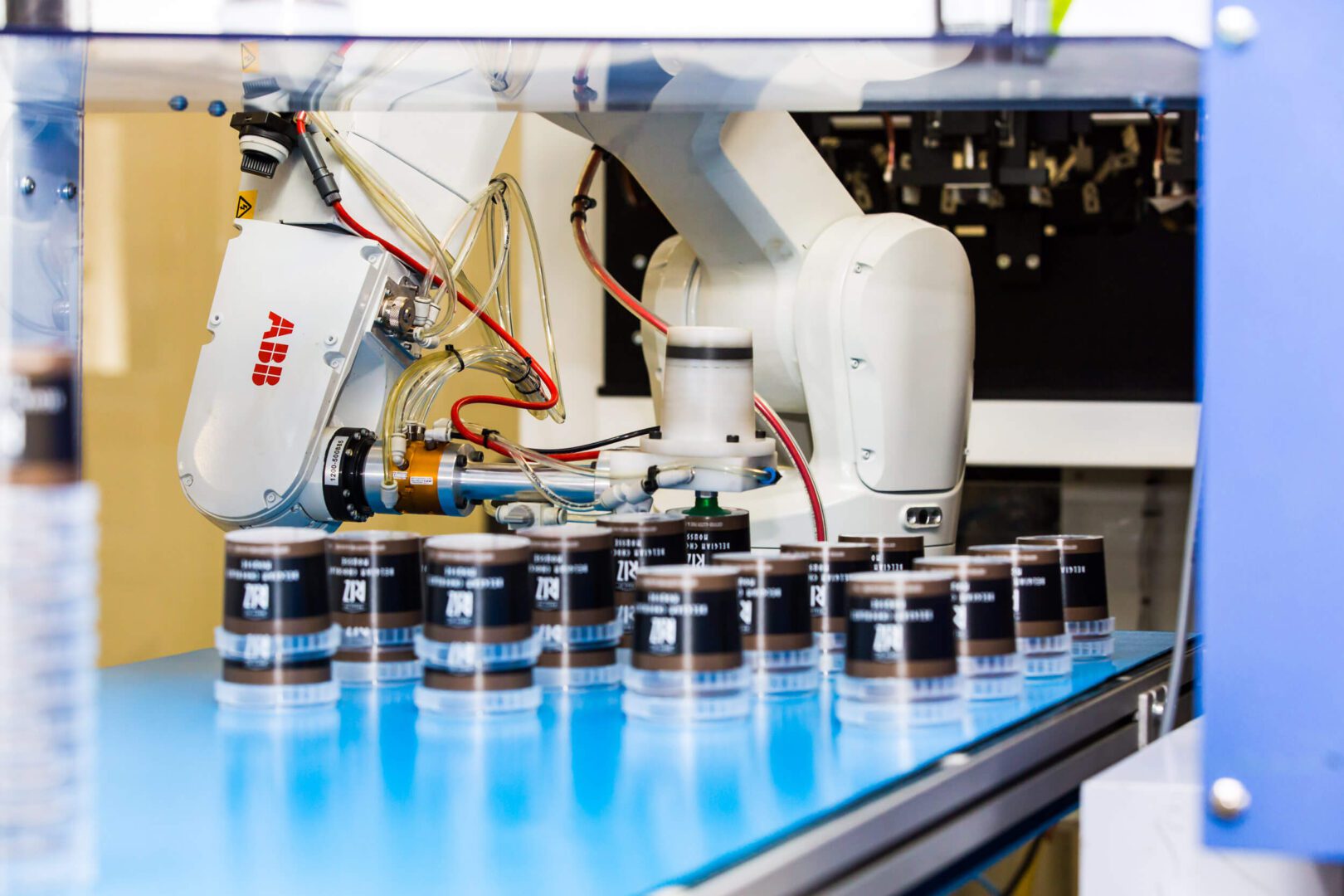 A Robotic Arm Taking Up Plastic Bottles